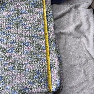Hand crocheted, single crochet, heavy duty blanket. Sizes are in the picture.